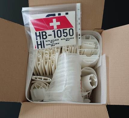 A box with a package of parts AI-generated content may be incorrect.